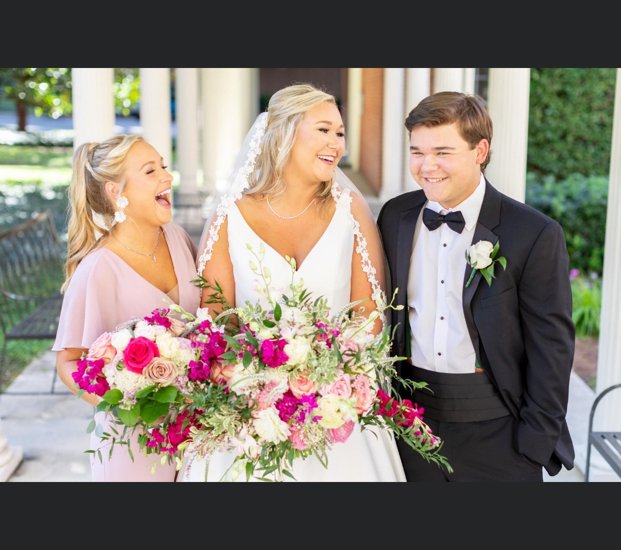 Formal wedding portrait with bouquet and tuxedo